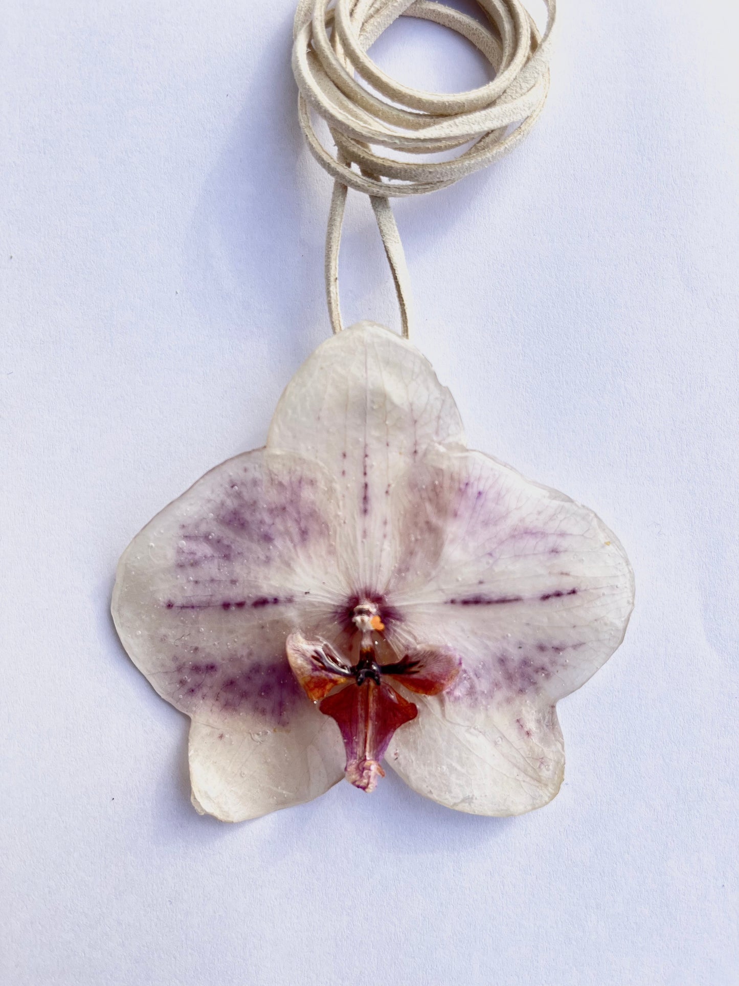 Orquídea, collar.